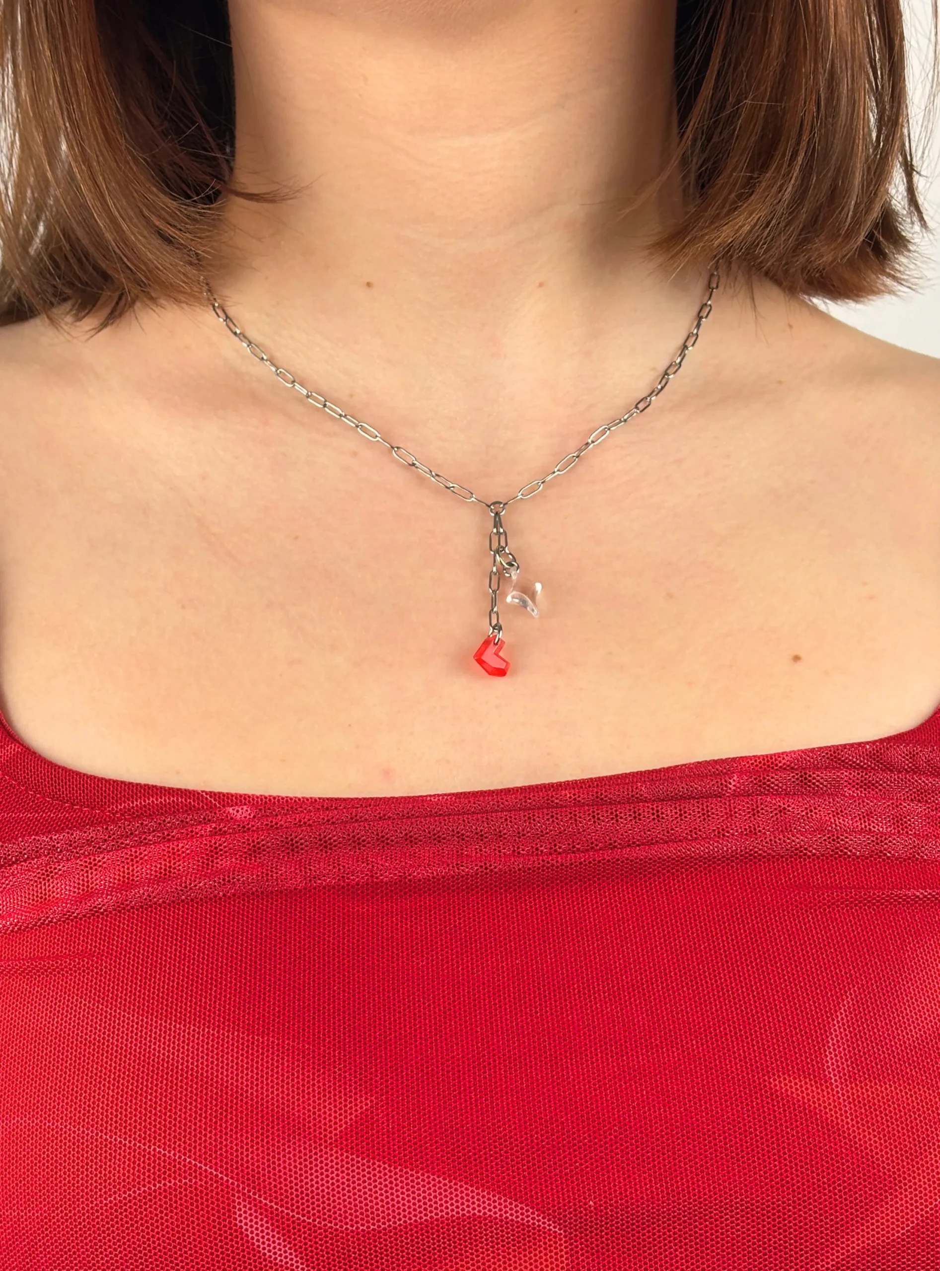 Collier en cascade argenté cœur rouge et étoile transparente