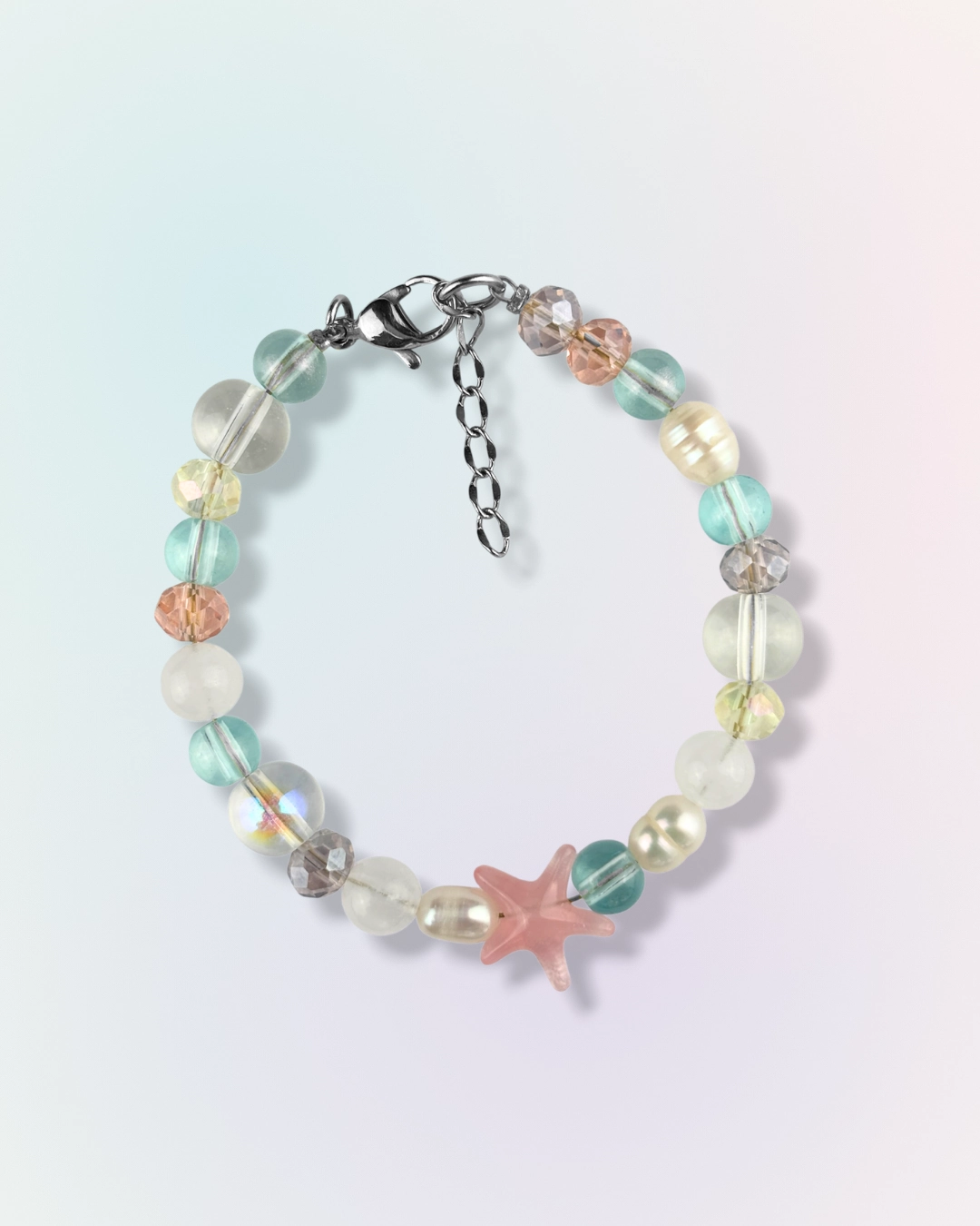 Bracelet Starfall en perles et pierres naturelles multicolores pastel avec charm étoile de mer rose, collection Mermaid Odyssée Bijoux