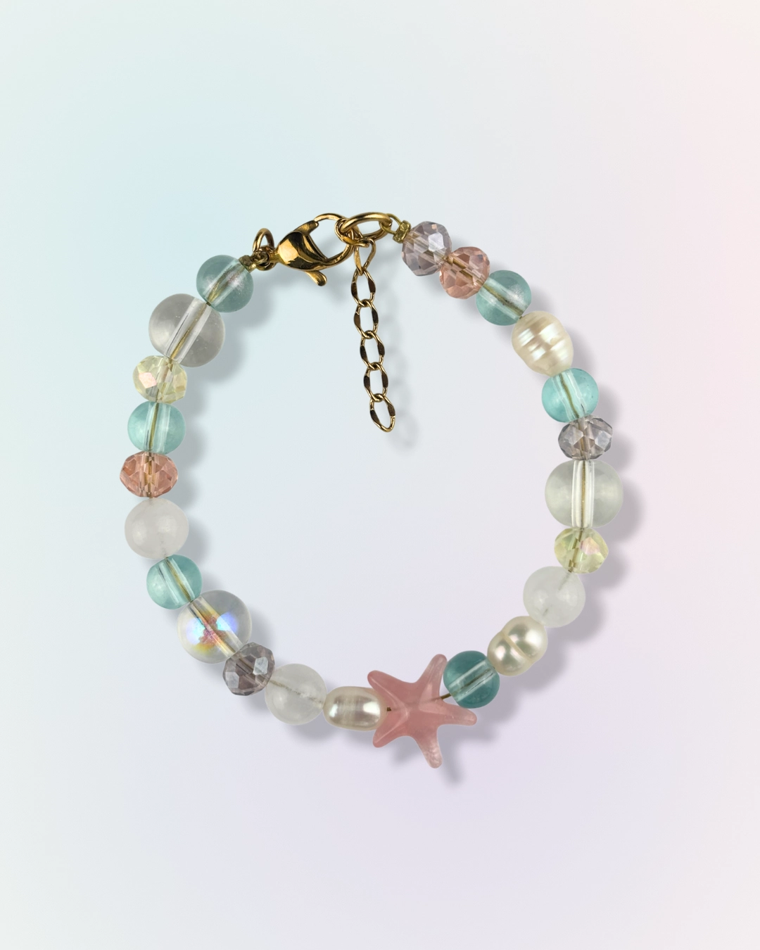 Bracelet Starfall en perles et pierres naturelles multicolores pastel avec charm étoile de mer rose, collection Mermaid Odyssée Bijoux